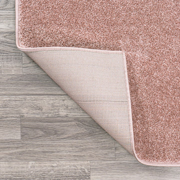 Haze Solid Low-pile Area Rug Pink